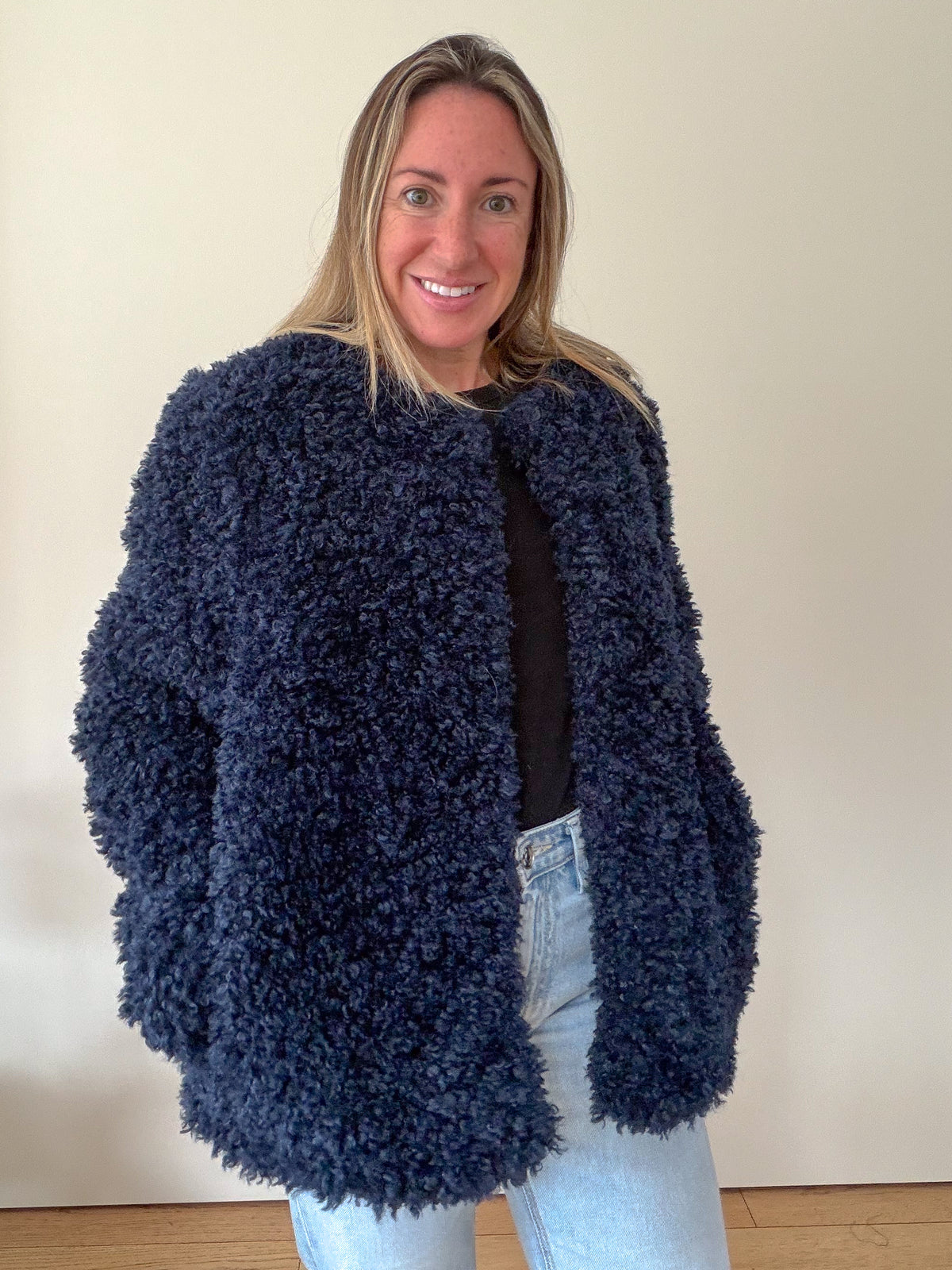 Aligne Francie navy jacket worn, side view full length