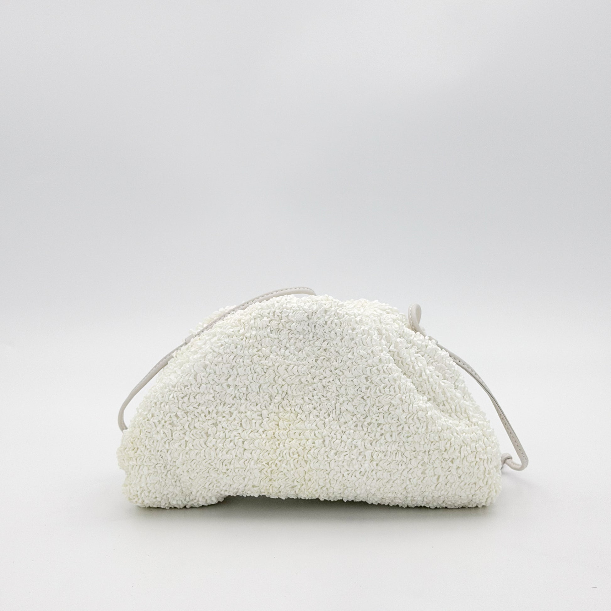 Bottega Veneta Mini Pouch front angled view with knotted leather strap