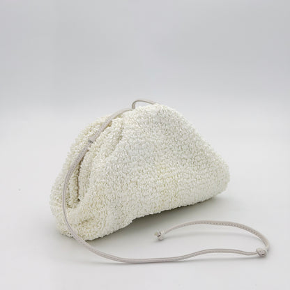 Bottega Veneta Mini Pouch front angled view with knotted leather strap