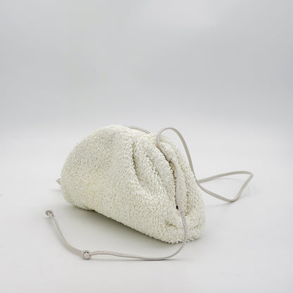 Bottega Veneta Mini Pouch front angled view with knotted leather strap