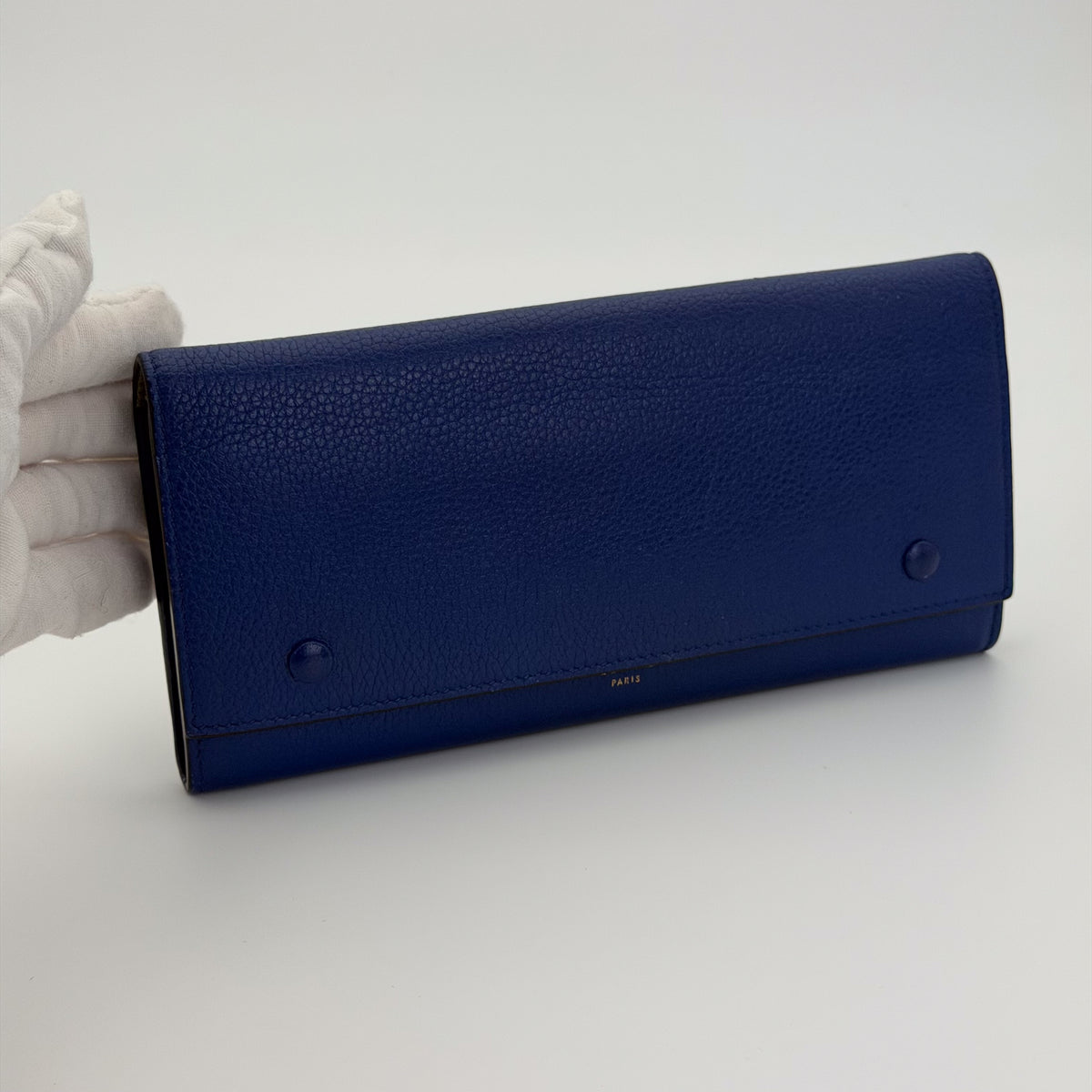 Céline cobalt blue grained calfskin wallet – side profile, closed flap