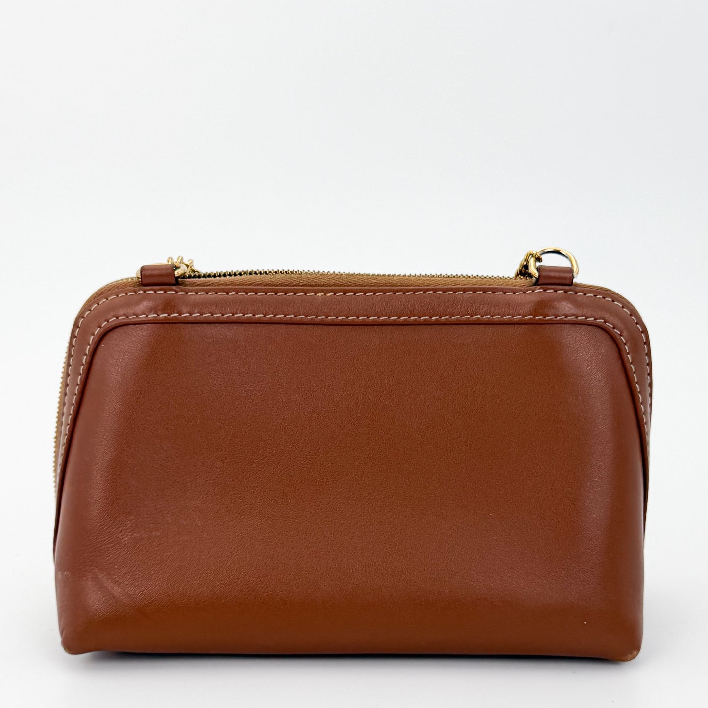Used Celine Triomphe tan calfskin clutch on chain rear view