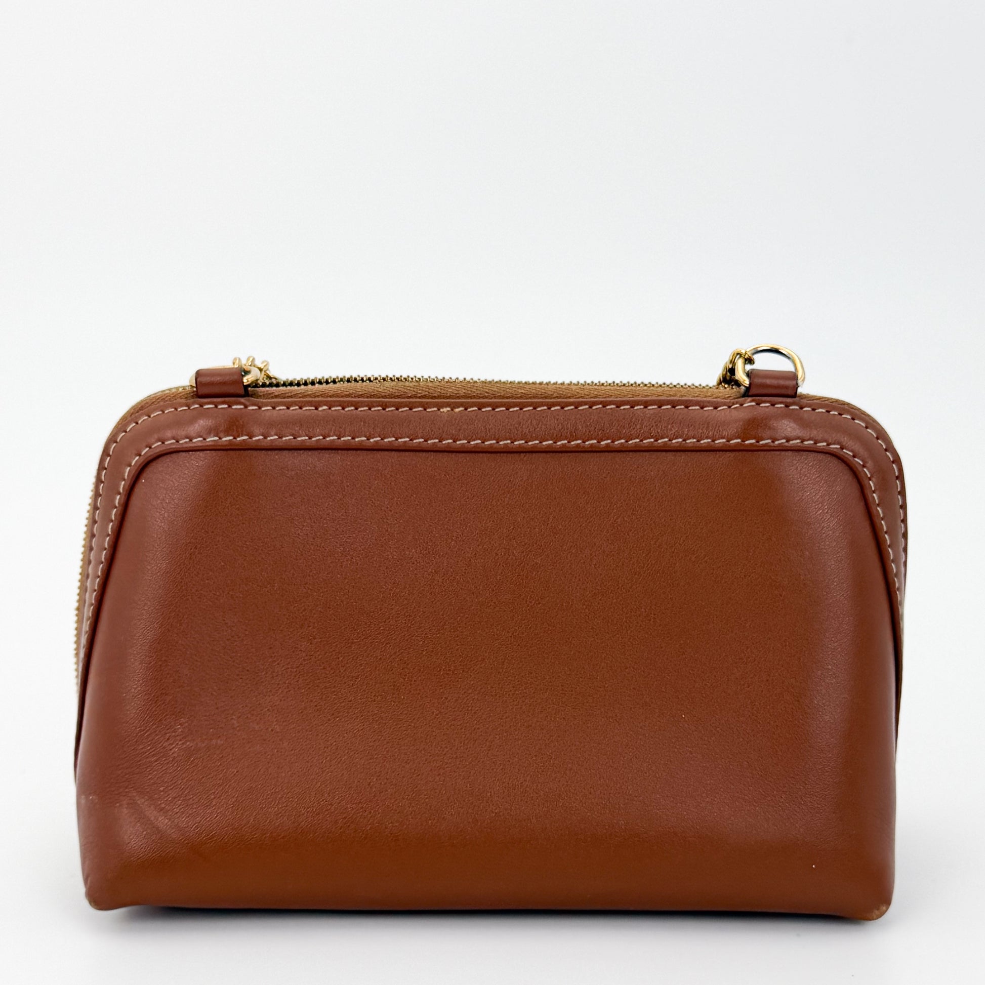 Used Celine Triomphe tan calfskin clutch on chain rear view