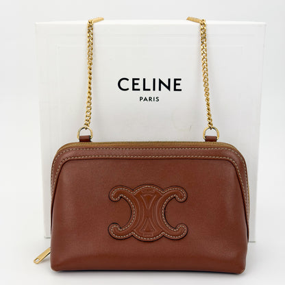 Preloved Celine Cuir Triomphe clutch on chain tan leather with Celine box front view