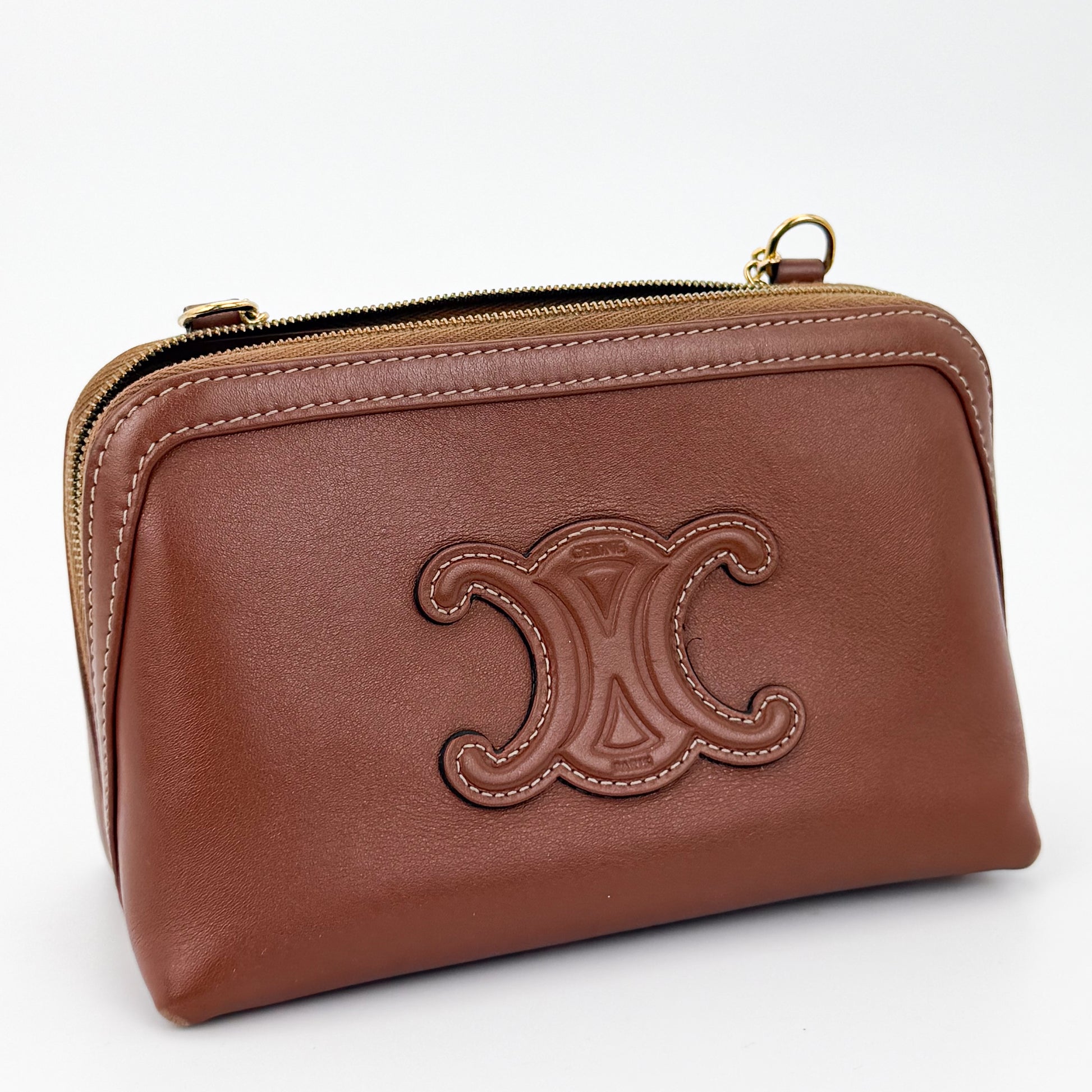 Used Celine Triomphe tan calfskin clutch on chain three-quarter front view