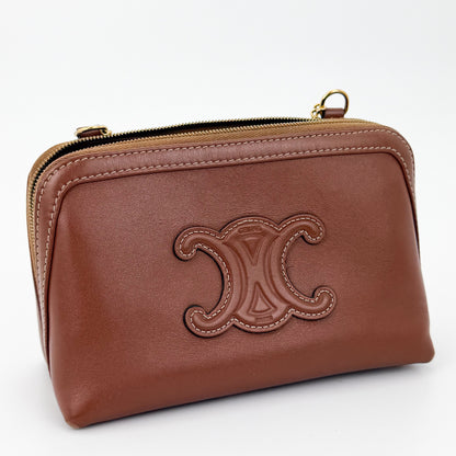 Used Celine Triomphe tan calfskin clutch on chain three-quarter front view