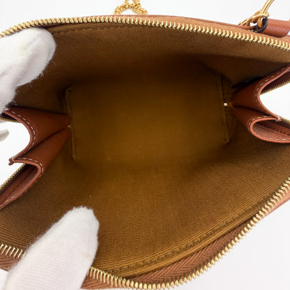 Celine Cuir Triomphe clutch interior view with slip pocket detail