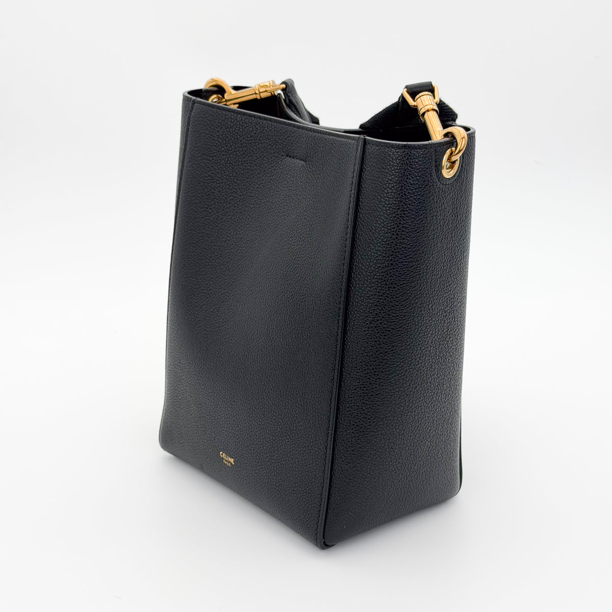 Celine black Seau Sangle bucket bag - side angle with strap