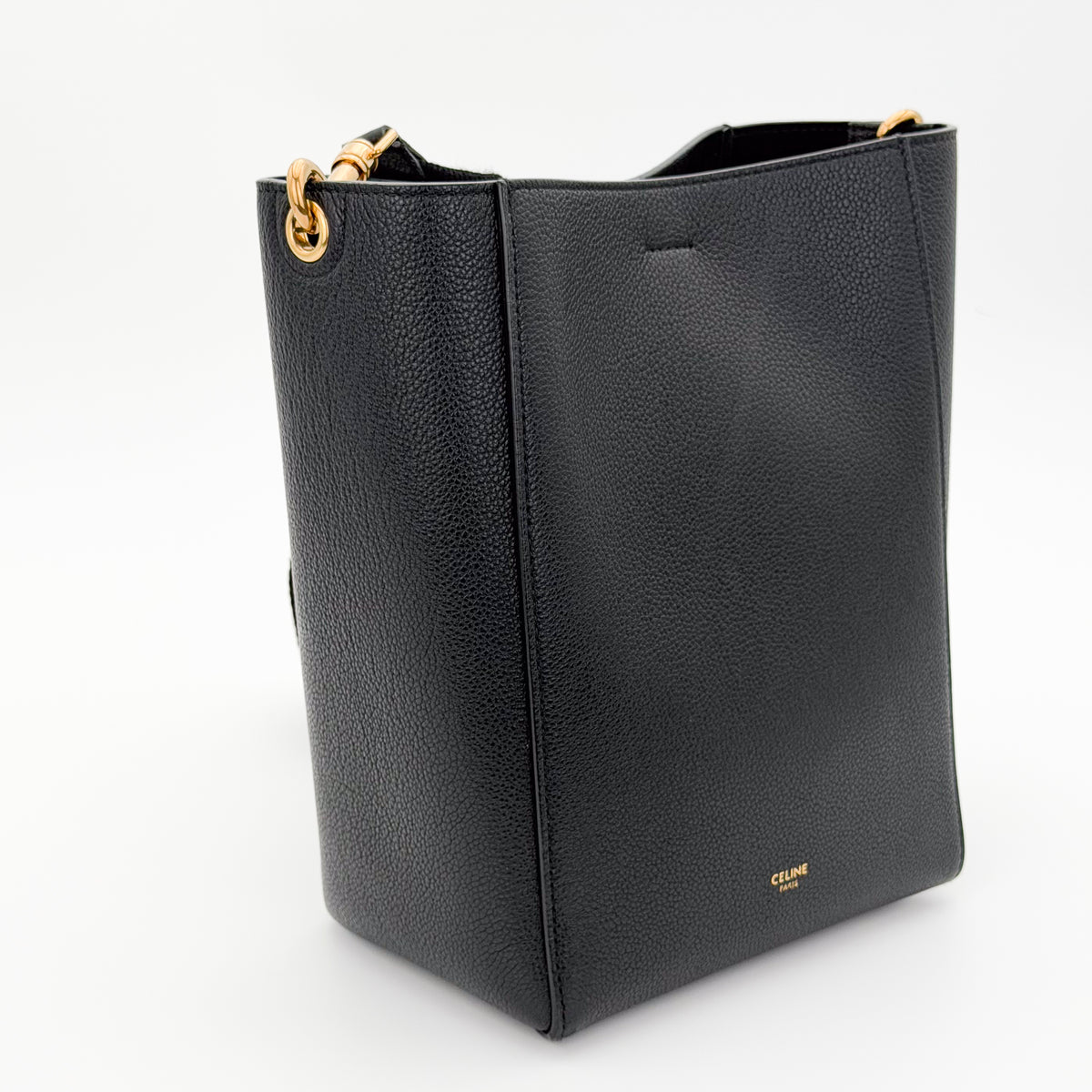 Celine black Seau Sangle bucket bag - side angle with strap