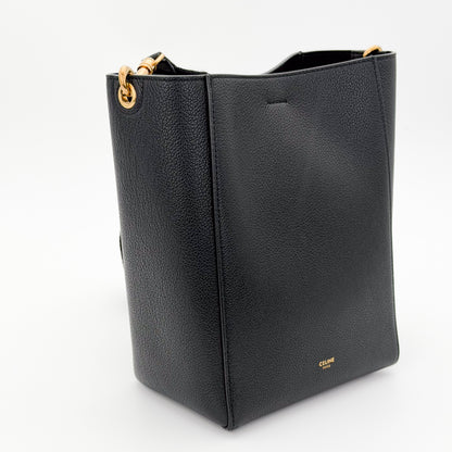 Celine black Seau Sangle bucket bag - side angle with strap