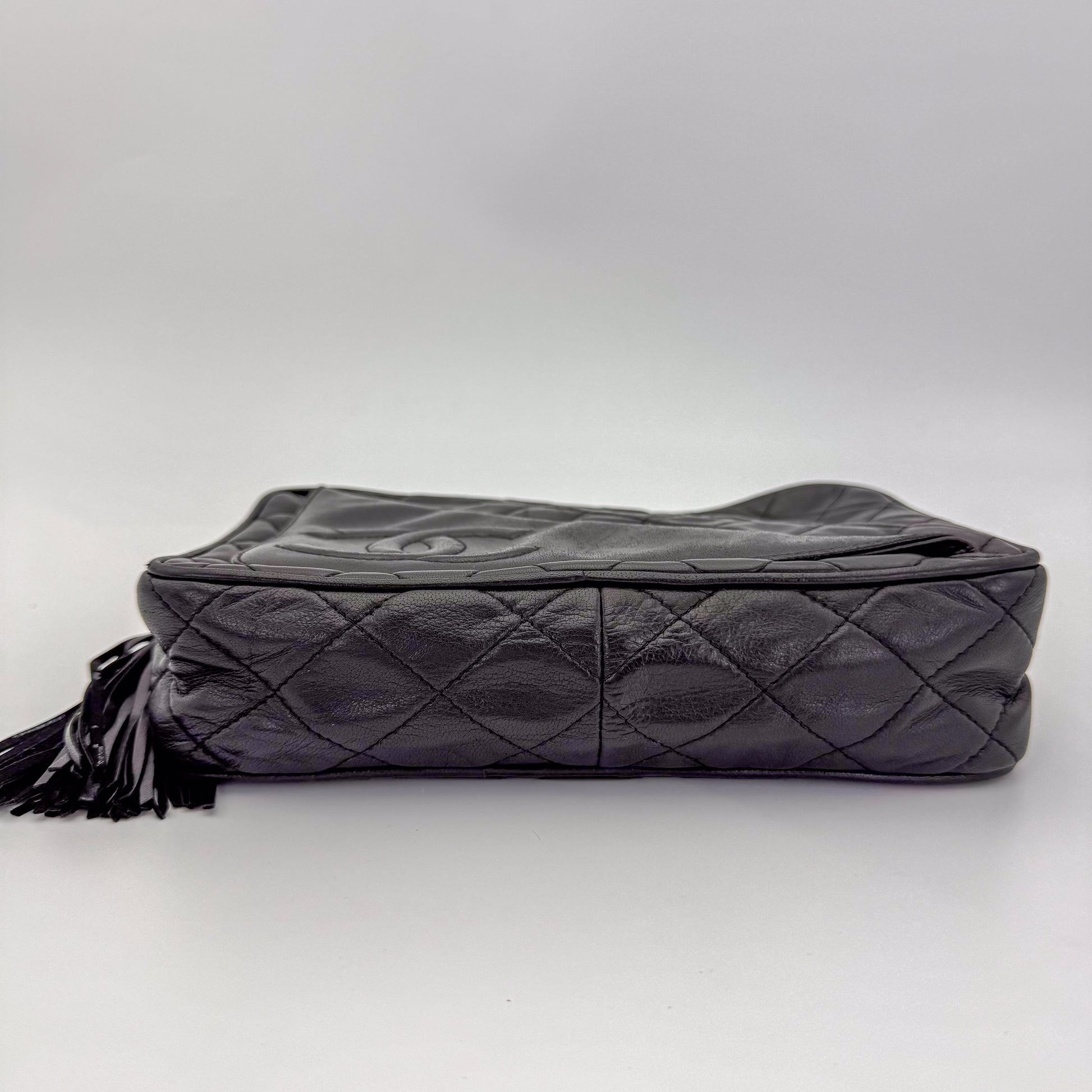 Vintage Chanel black quilted lambskin tassel camera bag with base