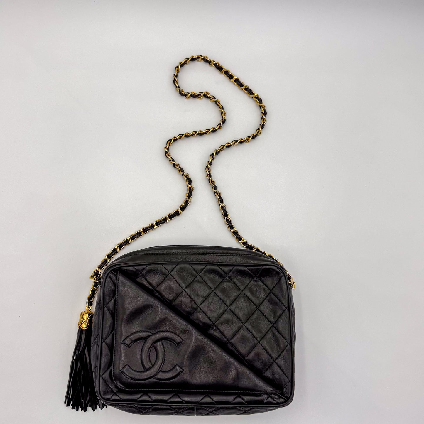 Vintage Chanel black quilted lambskin tassel camera bag Ariel view