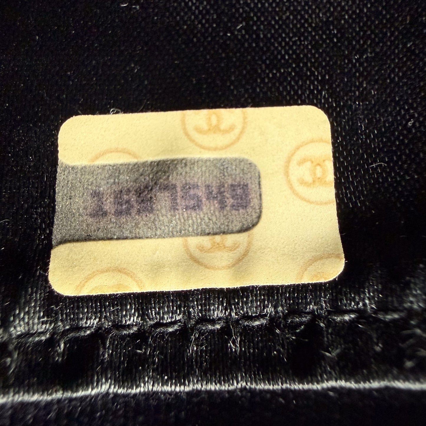 Serial number of a preloved Chanel black quilted lambskin tassel camera bag 