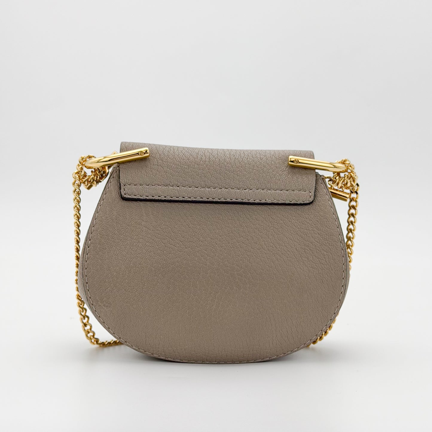Used Chloé Mini Drew taupe leather bag back view plain leather panel