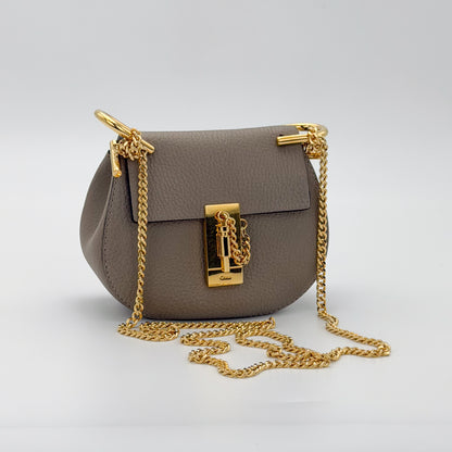 Used Chloé Mini Drew taupe leather bag front view with full chain strap