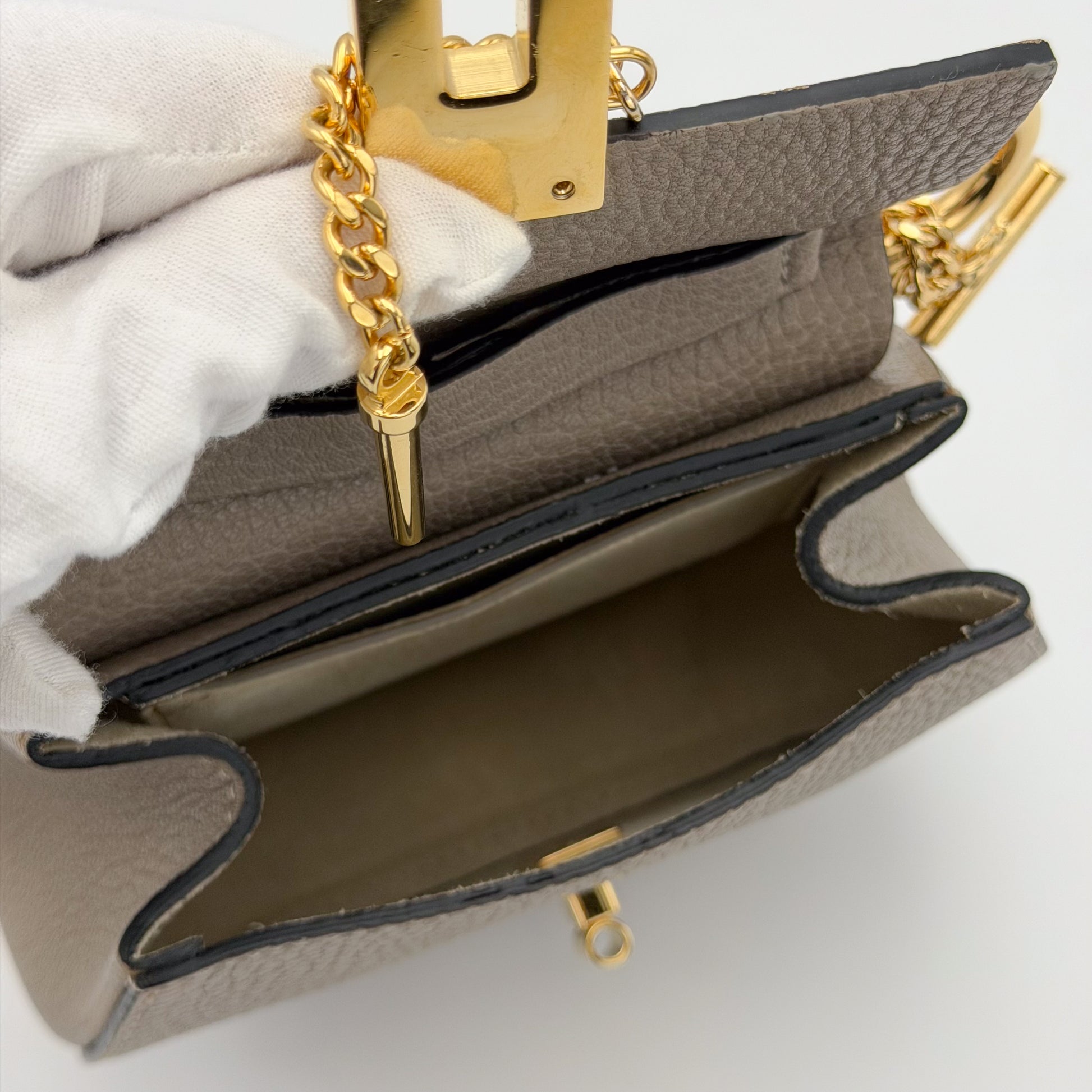 Chloé Mini Drew crossbody bag interior view showing suede lining and hardware