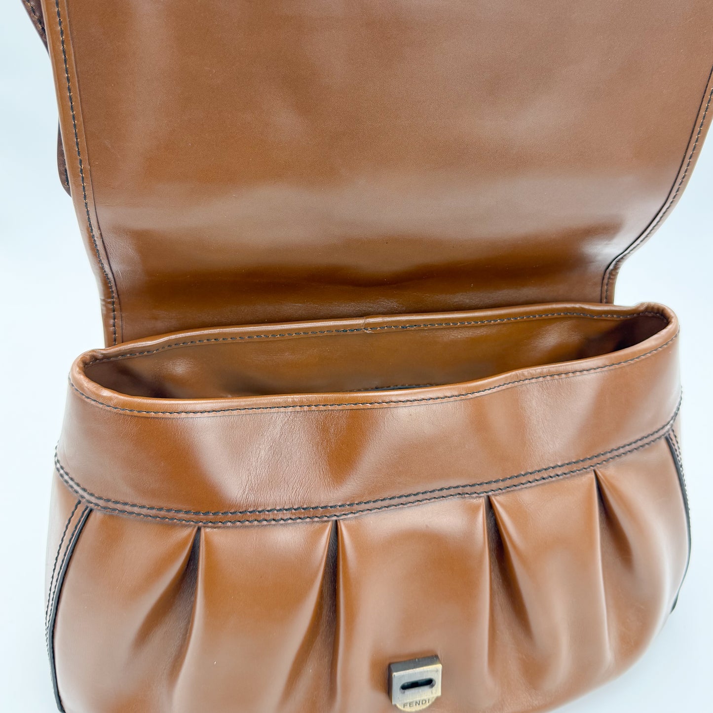 Vintage Fendi B Bag interior flap view showing pleated leather pocket