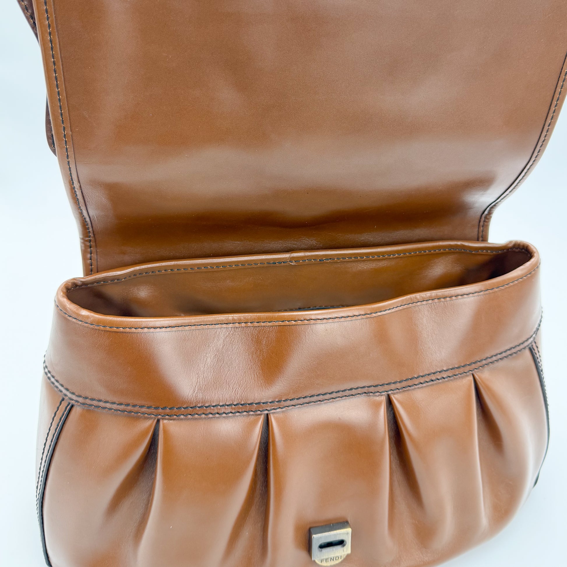 Vintage Fendi B Bag interior flap view showing pleated leather pocket