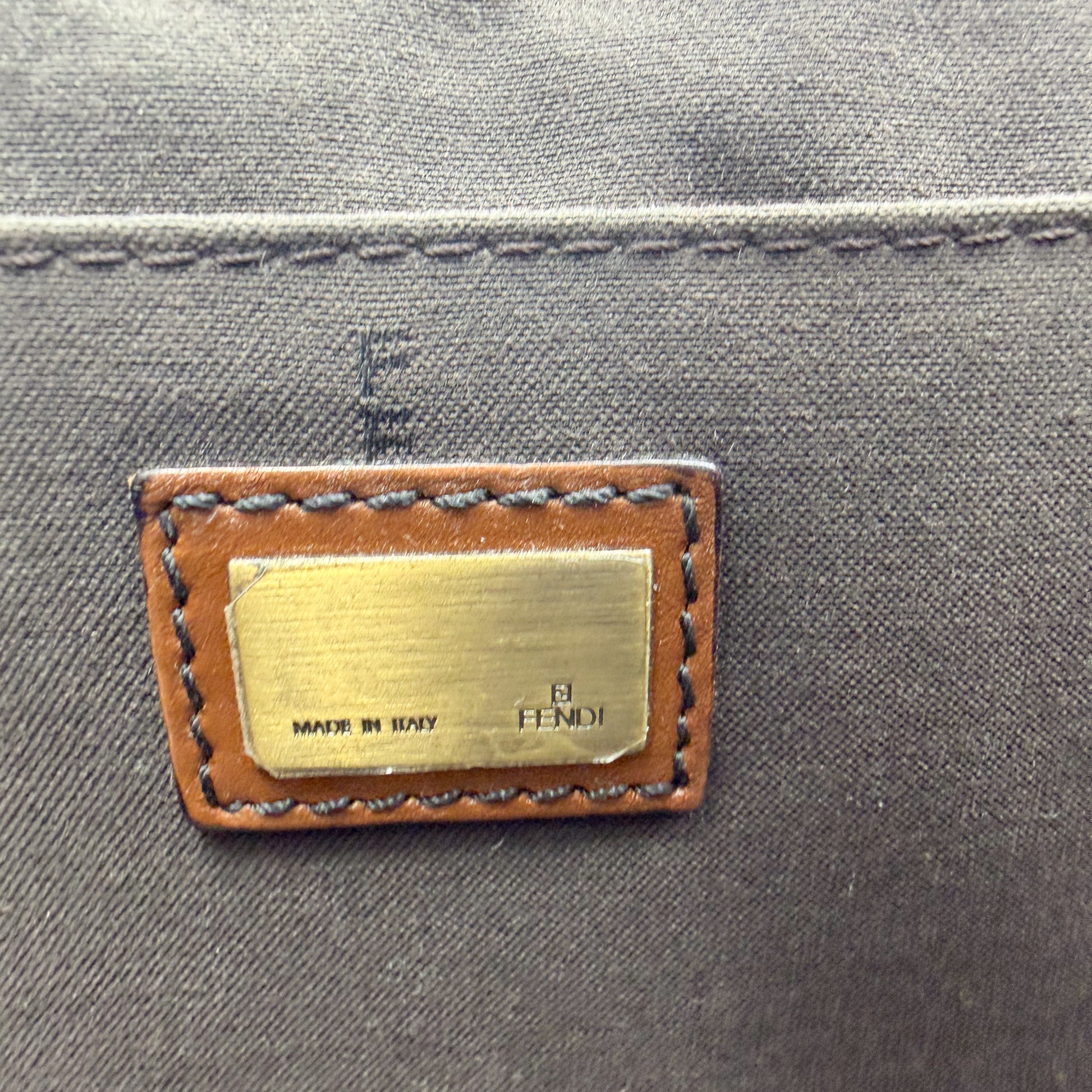 Preloved Fendi B Bag interior view with gunmetal chain hardware