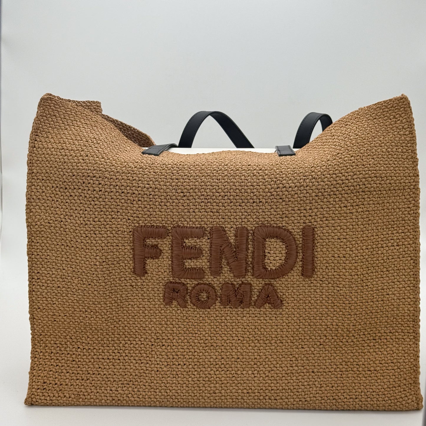 Authentic preloved Fendi Roma raffia oversized tote bag in natural beige with front view.