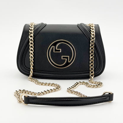 Unworn Gucci Blondie bag front view showing GG plaque and chain strap