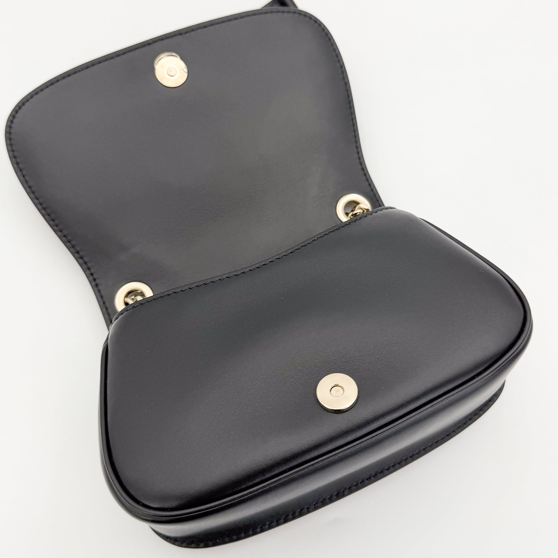 Gucci Blondie shoulder bag base view showing interior flap closure