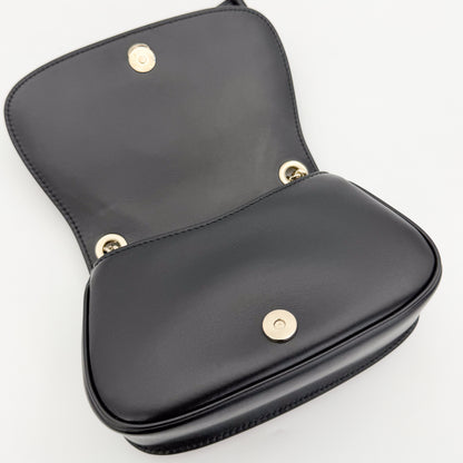 Gucci Blondie shoulder bag base view showing interior flap closure