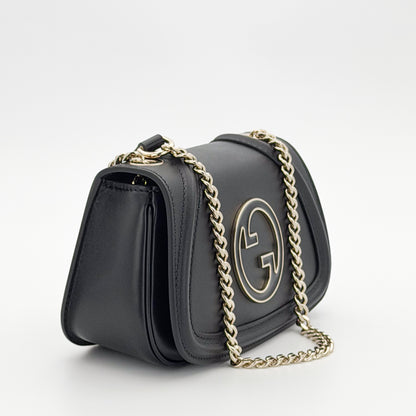 Brand new unworn Gucci Blondie shoulder bag left side view with gold chain strap