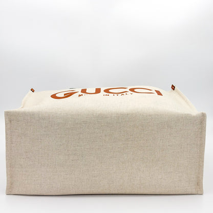 Authentic brand new Gucci canvas tote base view