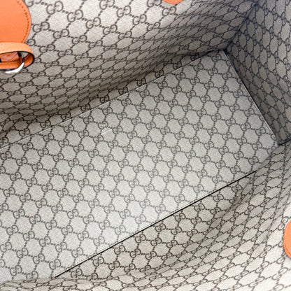 Gucci logo print tote base view showing canvas construction