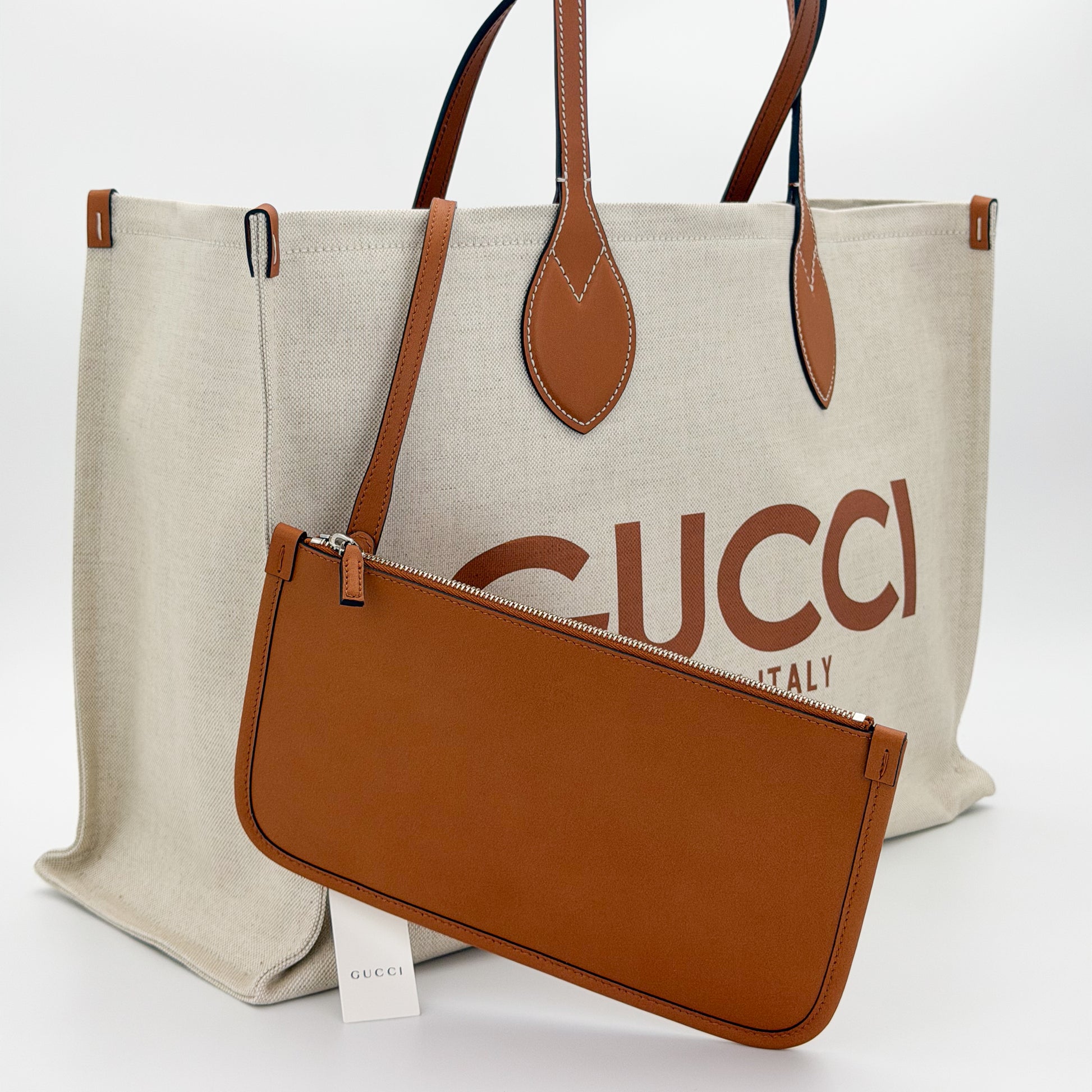 Gucci canvas tote with matching detachable tan leather pouch and hangtag