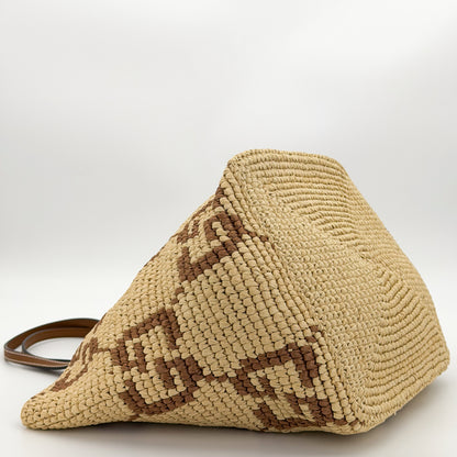 Brand new Gucci raffia tote base view showing woven construction from the side