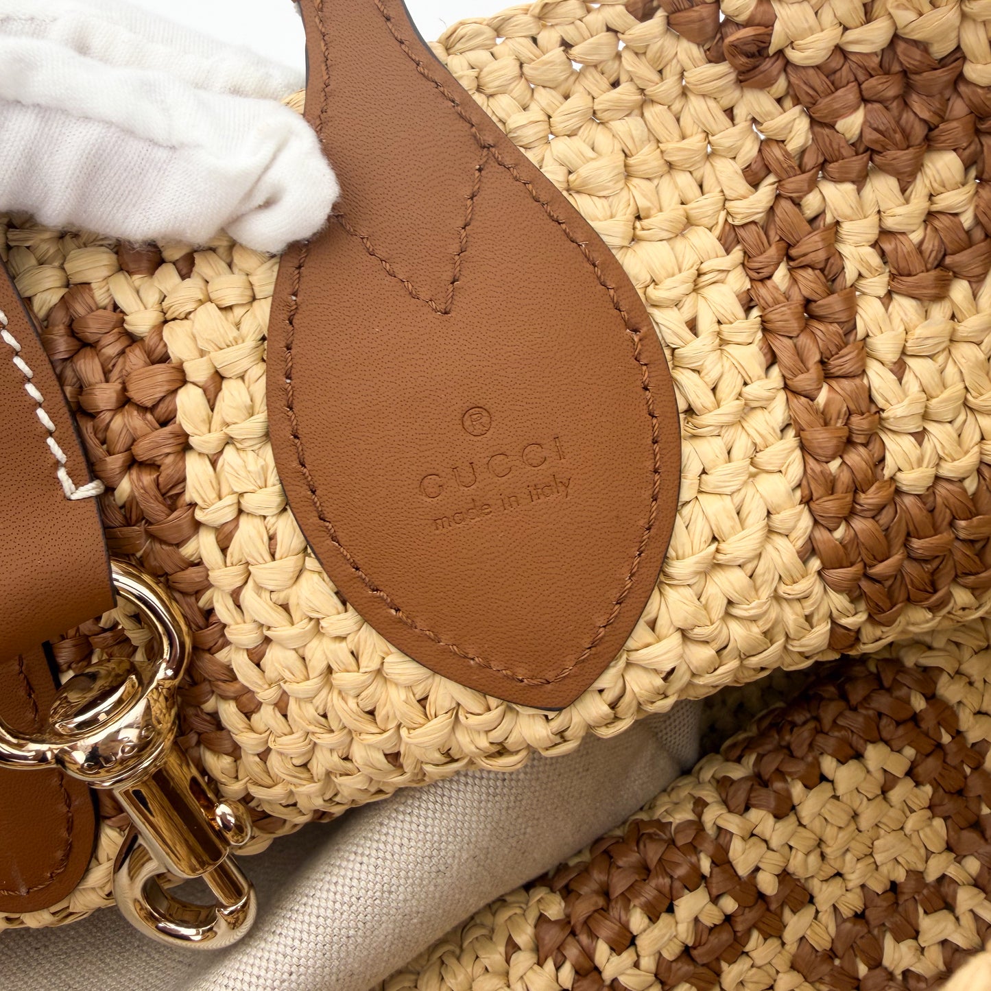Gucci raffia tote authenticity leather patch with serial number stamp