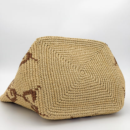 Brand new Gucci raffia tote base view showing woven construction
