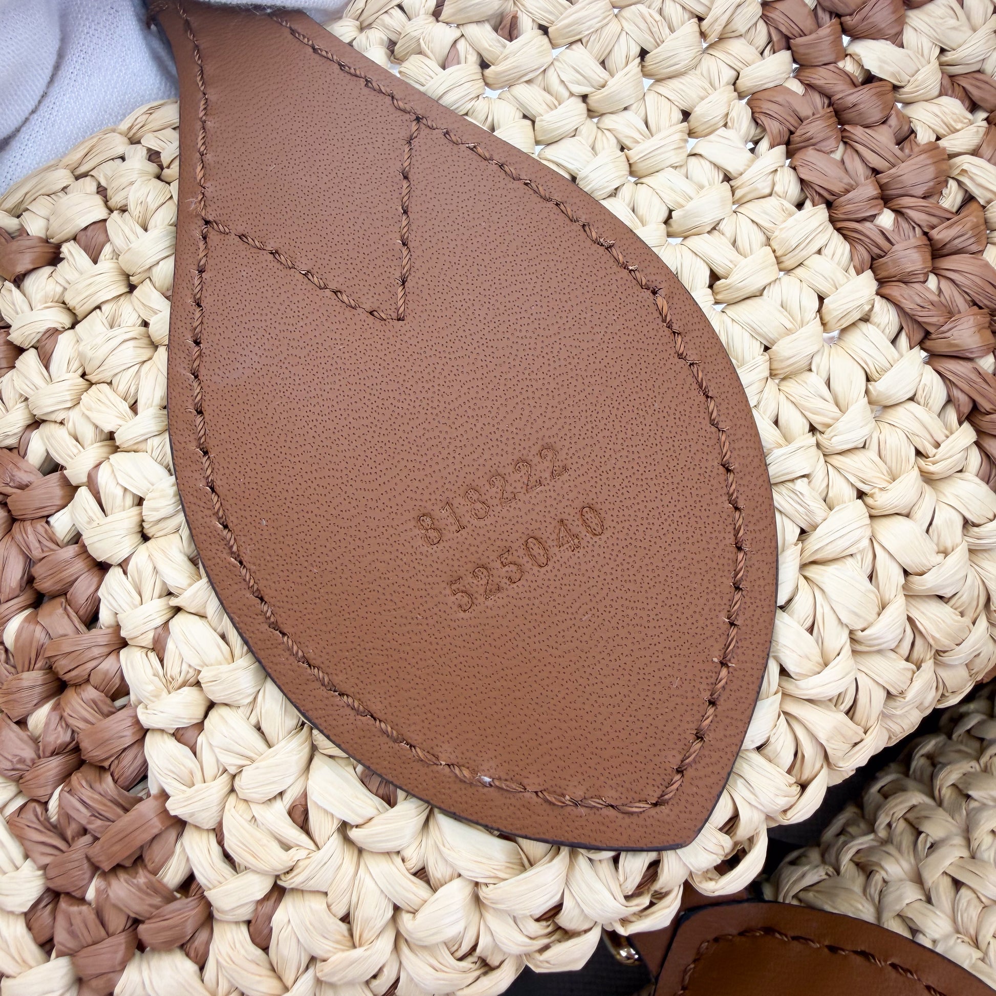 Gucci raffia tote authenticity leather patch with serial number stamp