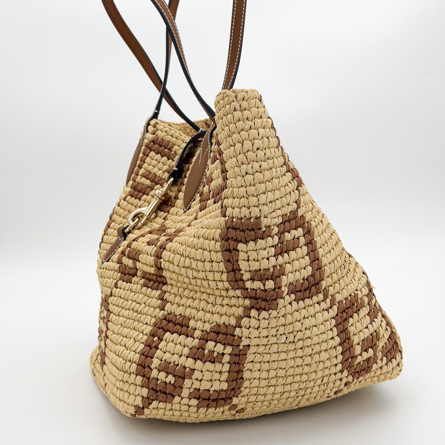 Brand new Gucci raffia tote side view 