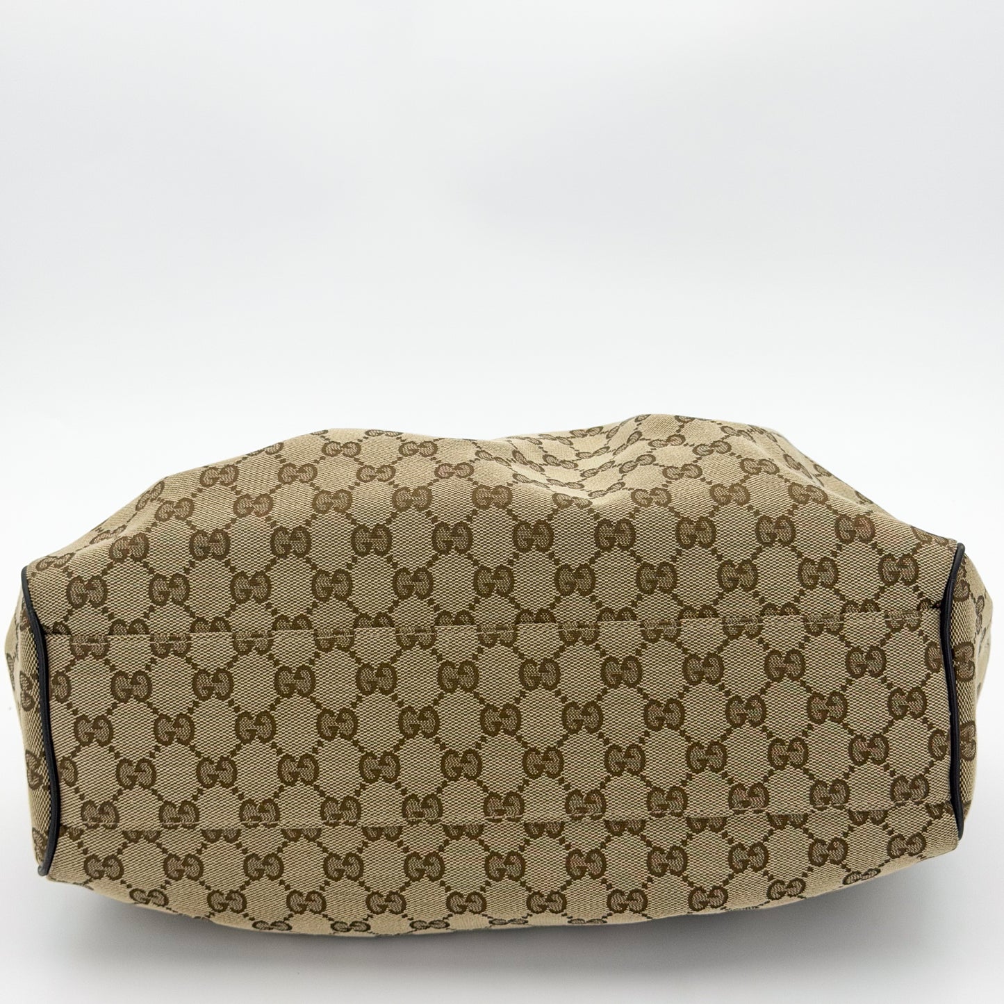 Gucci Sukey tote base view showing logo canvas
