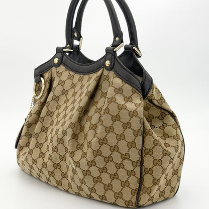Gucci Sukey tote left side view with gold-tone hardware detail