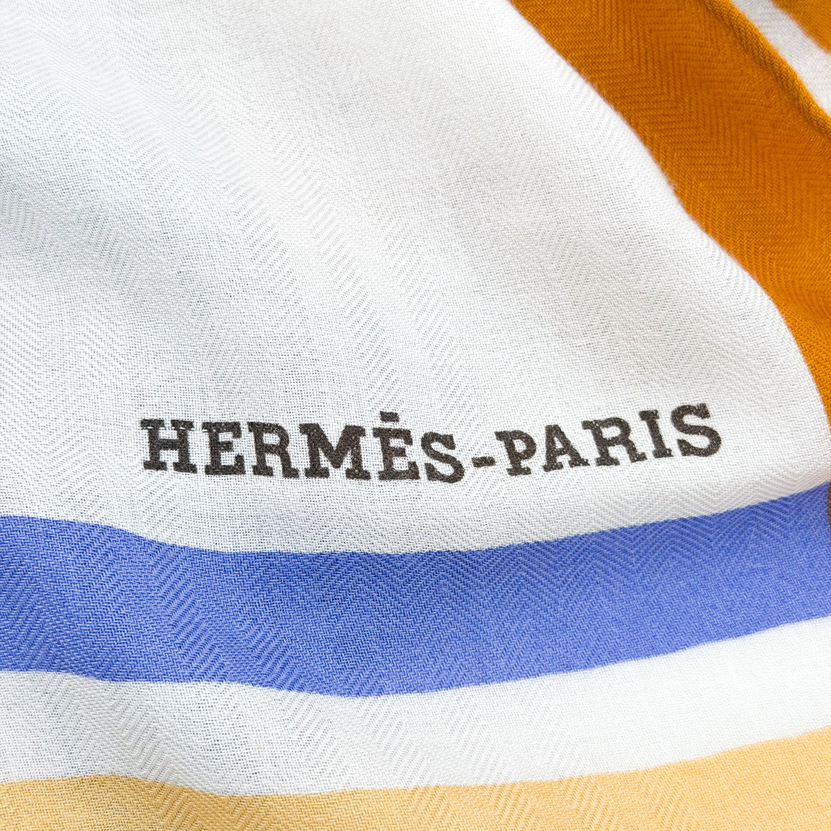 Hermès-Paris stamp and stripe border detail