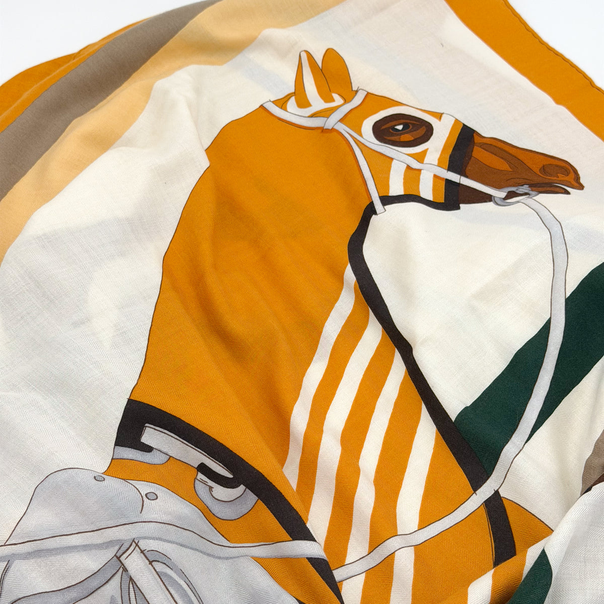 Hermès shawl, folded view showing horse print detail