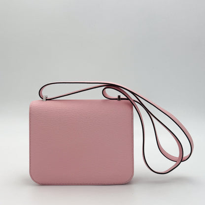 Hermès Constance 18 Rose Sakura Chèvre Mysore with original orange Hermès box and dust bag — back view