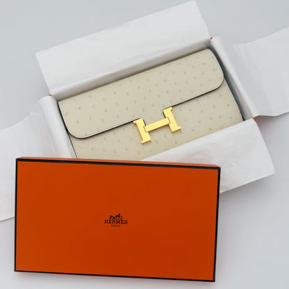 Brand New Hermès Constance To Go in Nata ostrich with gold hardware and original orange box.
