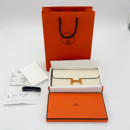 Brand new Hermès Constance To Go Nata ostrich gold hardware — with original orange box, dust bag, strap and receipt.