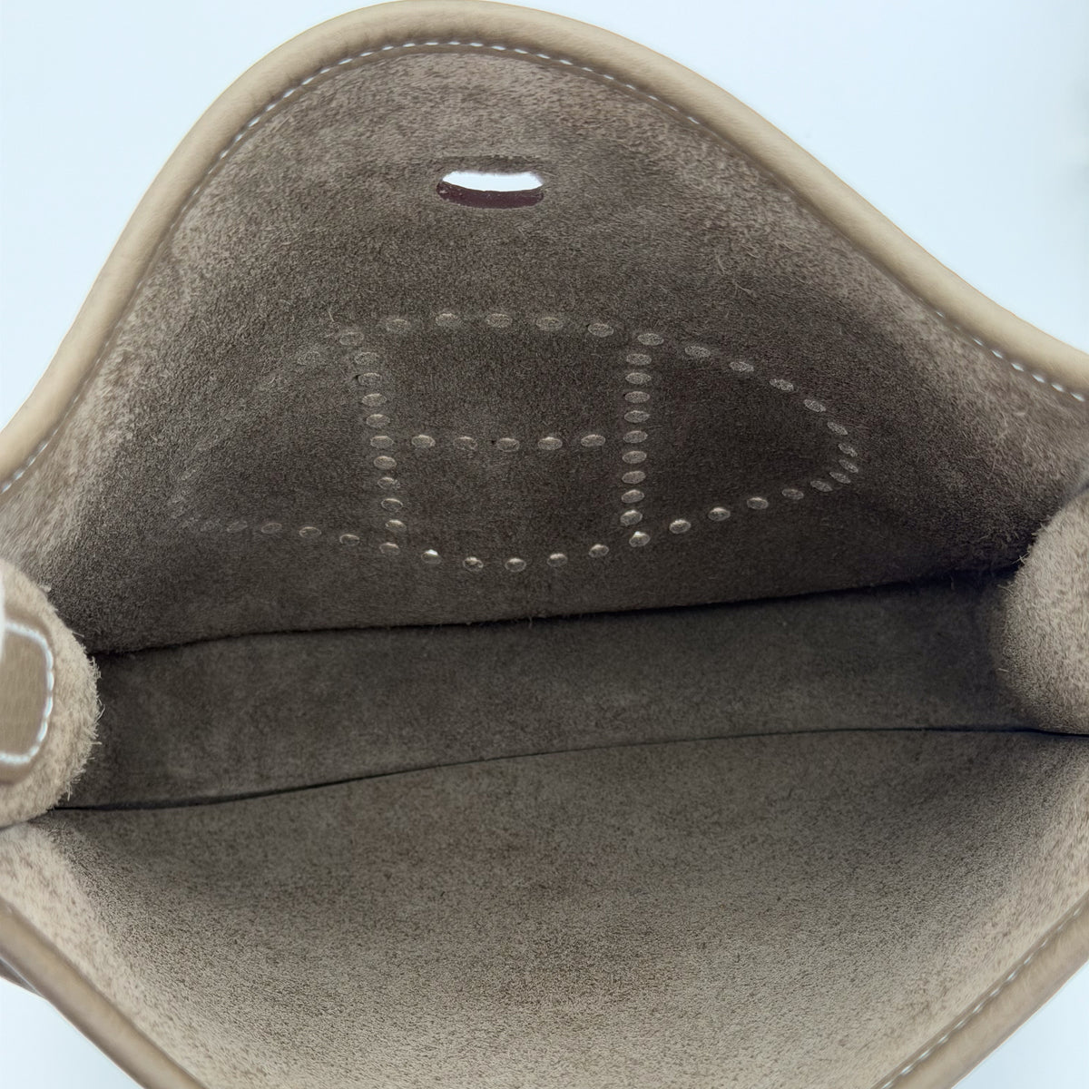Hermès Evelyne III open top view showing microsuede interior lining