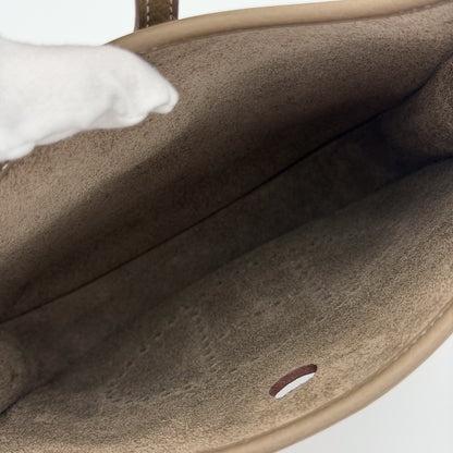 Hermès Evelyne III open top view showing microsuede interior lining