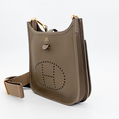Hermès Evelyne III front slip pocket with leather tab and stud closure