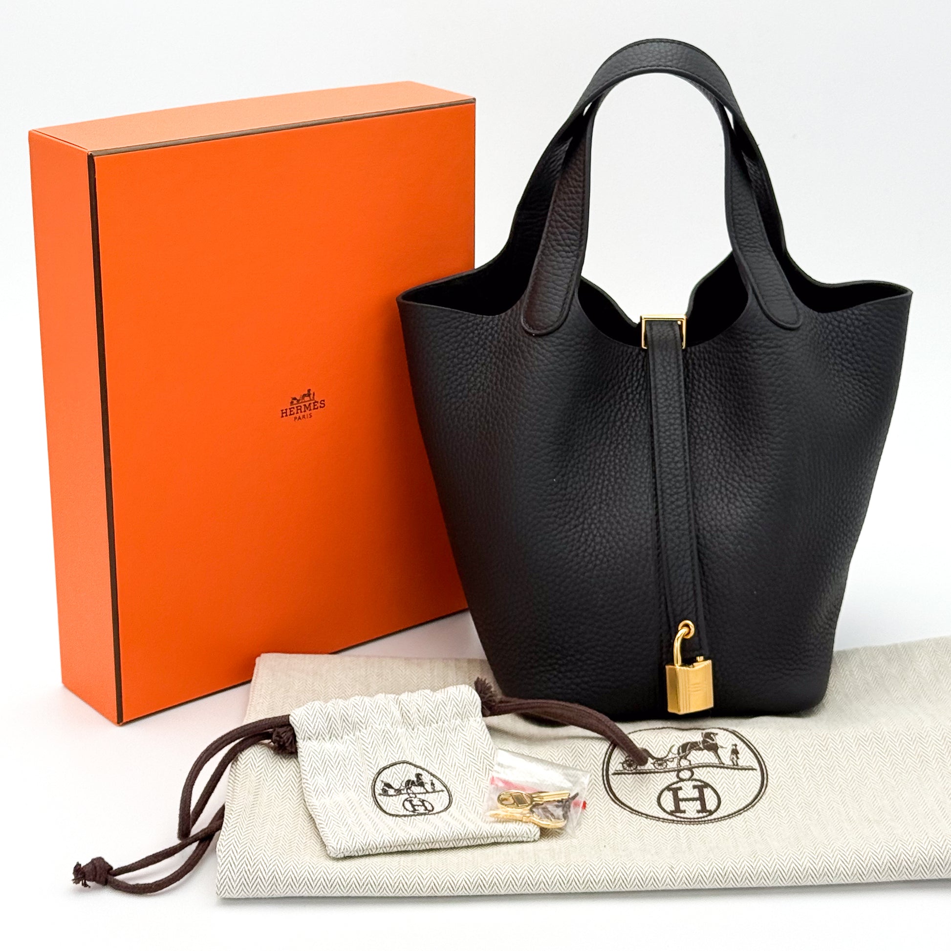 Brand New Hermès Picotin 18 Lock in Black Clemence Leather with gold hardware, lock, key and packaging.