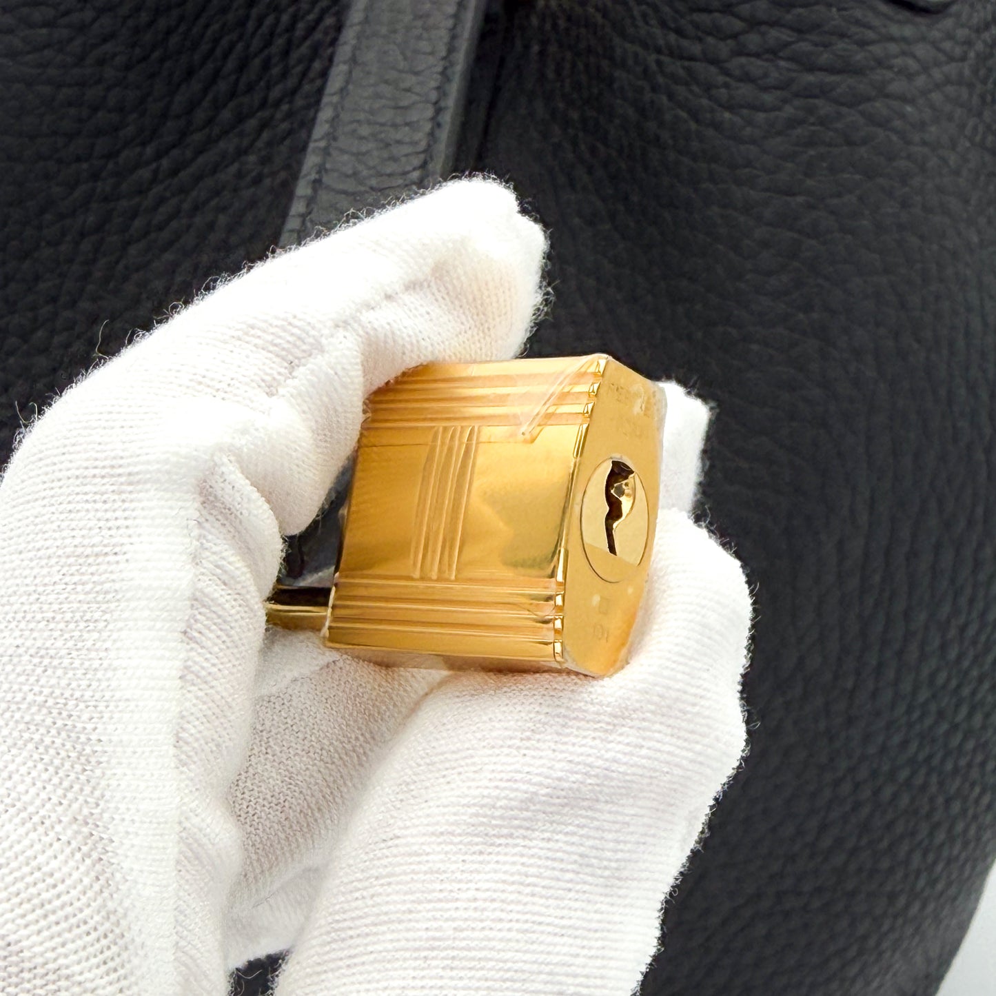 Close up of Hermès Picotin 18 Lock in Gold Hardware