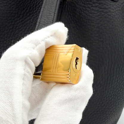 Close up of Hermès Picotin 18 Lock in Gold Hardware