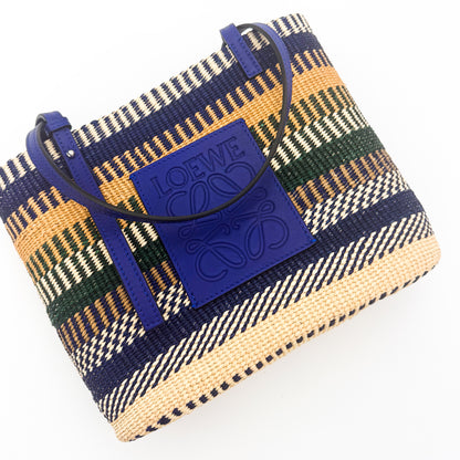 Loewe x Paula's Ibiza Square Basket Bag in striped raffia with cobalt blue leather handles — Ariel view